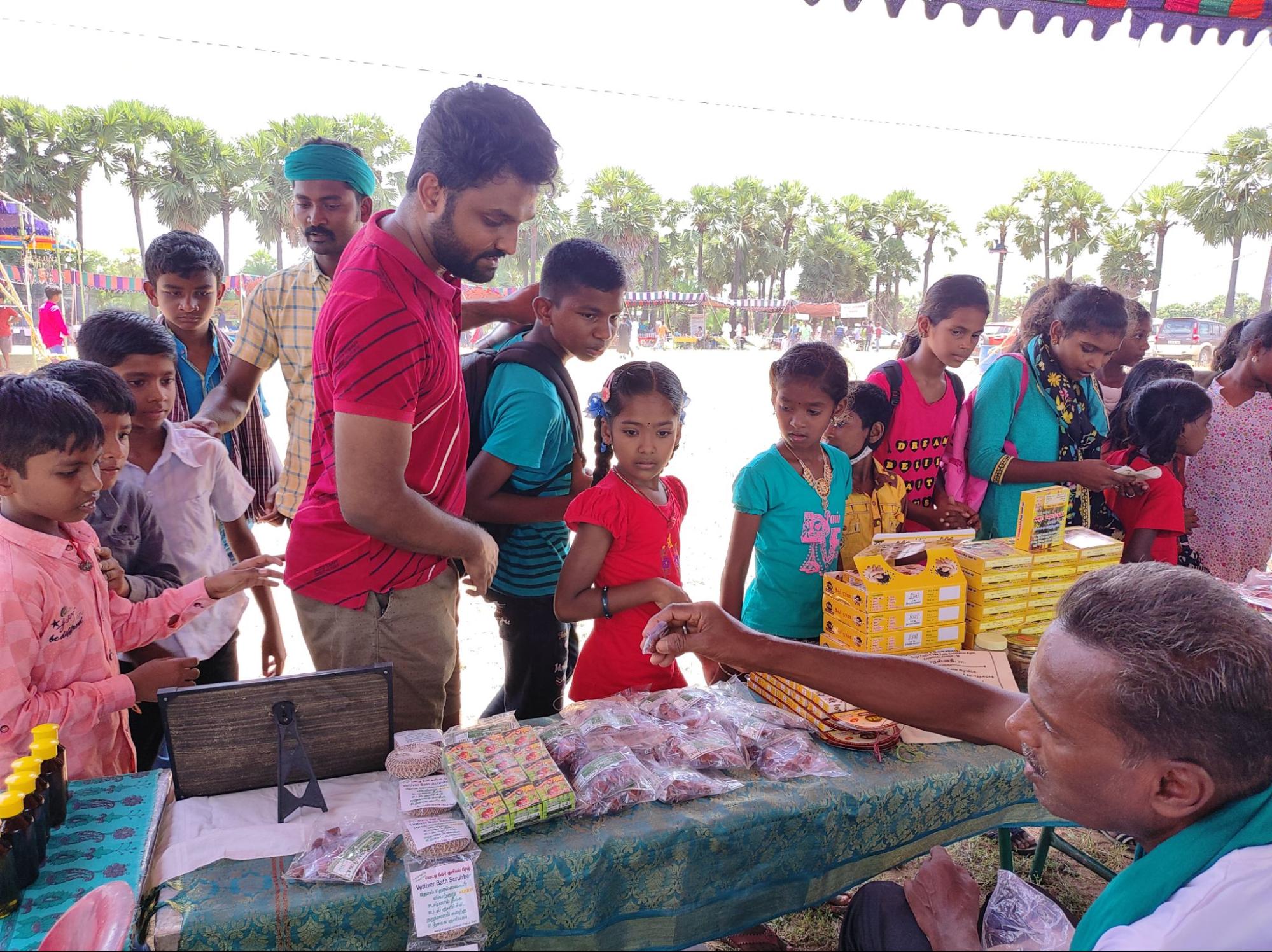 Yuvabe's Quilt.ai team member, Sharath Kumar, with students of Isai Ambalam School